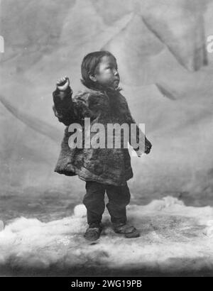 Eskimo child, between c1900 and c1930 Stock Photo - Alamy