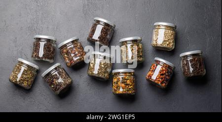 Tea time assortment: Various dry tea leaves. Flat lay Stock Photo