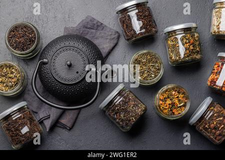 Tea time assortment: Various dry tea leaves. Flat lay Stock Photo