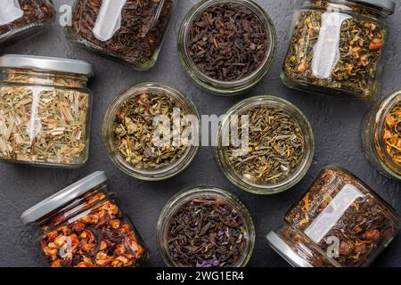 Tea time assortment: Various dry tea leaves. Flat lay Stock Photo