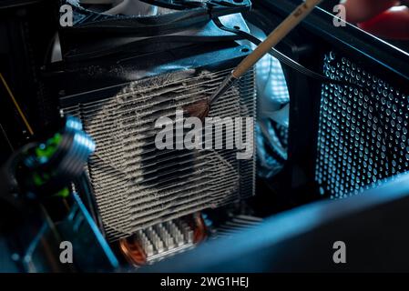 Dirty cooler ventilation system unit computer, cleaning from dust. Stock Photo