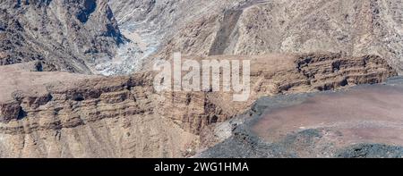 aerial landscape with Dolerite cliffs in canyon near Sunset viewpoint, shot in bright late spring light at Fish River Canyon, Namibia, Africa Stock Photo