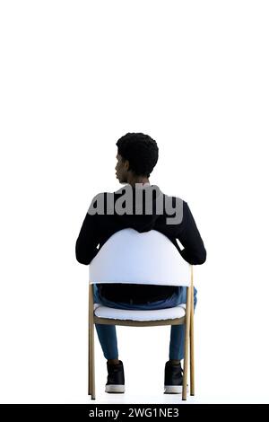 A man, full-length, on a white background, sitting on a chair Stock Photo