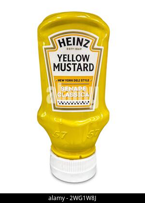Italia - January 30, 2024:  Heinz yellow mustard sauce in plastic squeeze bottle isolated on withe with clipping path included. Classic American Musta Stock Photo