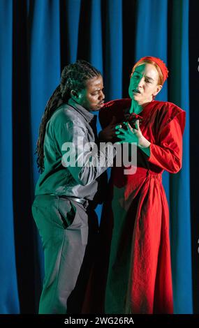 Zwakele Tshabalala (Nick), Kate Lindsey (Offred) in THE HANDMAID'S TALE at English National Opera (ENO), London Coliseum, London WC2  01/02/2024  music: Poul Ruders  libretto: Paul Bentley after the novel by Margaret Atwood  conductor: Joana Carneiro  design: Annemarie Woods  video design: Akhila Krishnan  original lighting: Paule Constable  original movement & intimacy coordinator: Imogen Knight  director: Annilese Miskimmon Stock Photo