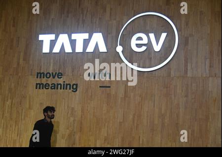 New Delhi, Delhi, India. 2nd Feb, 2024. A man passes by a hoarding of Tata Motor's passenger electric vehicles 'Tata.ev' at the Bharat Mobility Global Expo 2024, in New Delhi, India on February 2, 2024. (Credit Image: © Kabir Jhangiani/ZUMA Press Wire) EDITORIAL USAGE ONLY! Not for Commercial USAGE! Stock Photo