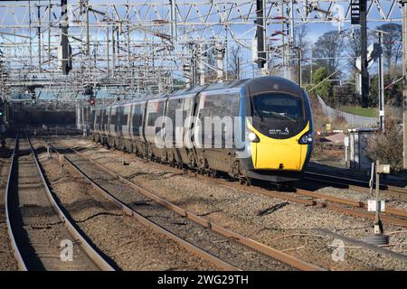 Avanti West Coast Pendolino 390013 working 1A33 11:35 Manchester Piccadilly to London Euston approaching Lichfield Trent Valley on 2 February 2024 Stock Photo