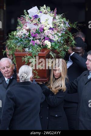 London, UK. 02nd Feb, 2024. Kate Garraway's daughter Darcey, 17, carries the coffin of her father Derek Draper as it leaves The Church of St Mary the Virgin, Primrose Hill in North London following his funeral. Derek Draper, a former political lobbyist and husband of television presenter Kate Garraway, died following a long illness caused by COVI-19 infection. Photo credit: Ben Cawthra/Sipa USA Credit: Sipa USA/Alamy Live News Stock Photo