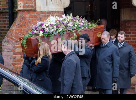 London, UK. 2nd Feb, 2024. Pallbearers carry the coffin from the church. His daughter, Darcey(front right) carries the coffin. The funeral of Derek Draper, husband of Kate Garraway, at the Church of St Mary the Virgin, Primrose Hill. Derek Draper died on 3rd January 2024. Credit: Karl Black/Alamy Live News Stock Photo