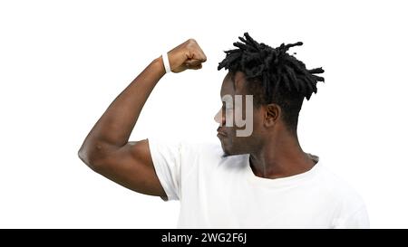 Man, close-up, on a white background, shows strength Stock Photo