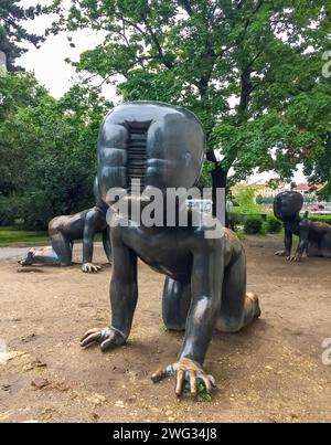 PRAGUE- CZECH - 1 August 2021: Three big bronze baby sculptures, David Cerny Stock Photo