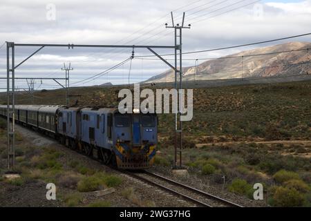 Travelling through the Karoo near Matjiesfontein on luxury Rovos Rail Journey from Pretoria to Cape Town in South Africa Stock Photo