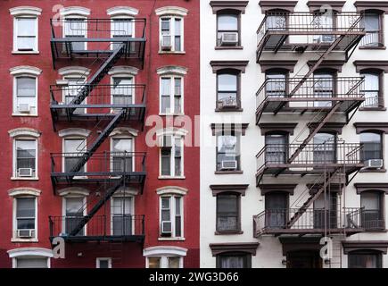 New York City old fashioned apartment buildings with external fire ladders Stock Photo
