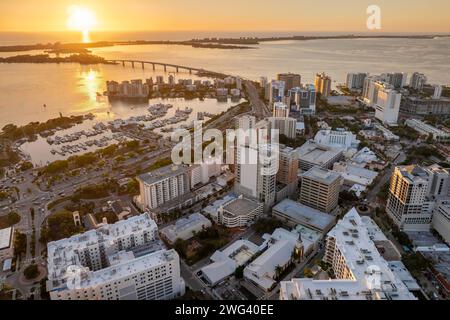Sarasota, Florida at sunset. Luxury yachts docked in Sarasota Bay marina. American city downtown architecture with high-rise office buildings. USA Stock Photo