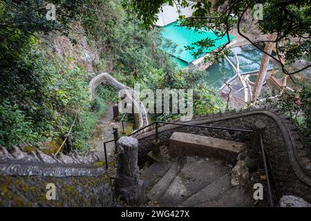 Mae Sai, Thailand. 17th Jan, 2024. Dragon stairs at the Wat Tham Pla Temple. Wat Tham Pla (Cave Fish Temple) is also referred to as the 'Monkey Temple' for Thai locals, located 16 kilometers from Mae Sai, the northernmost city of Thailand. (Photo by Guillaume Payen/SOPA Images/Sipa USA) Credit: Sipa USA/Alamy Live News Stock Photo