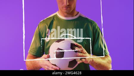 Image of caucasian male soccer player over stadium drawing Stock Photo
