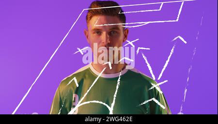 Image of caucasian male soccer player over stadium drawing Stock Photo