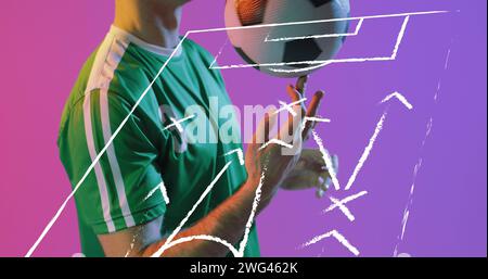 Image of caucasian male soccer player over stadium drawing Stock Photo