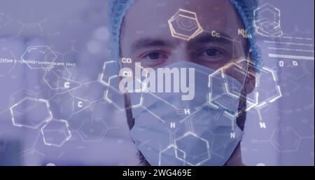 Image of medical data processing over biracial male doctor in hospital Stock Photo