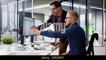 Spreadsheet Analyst Employee Worker. Medical Report On Computer Stock Photo