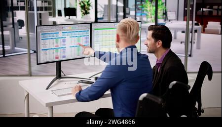Spreadsheet Analyst Employee Worker. Medical Report On Computer Stock Photo