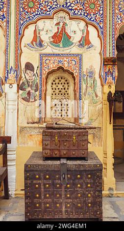 Paintings and ancient Iron Boxes in Shri Pushkar thalia Haveli, Mandawa, Jhunjhunu, Rajasthan, India. Stock Photo