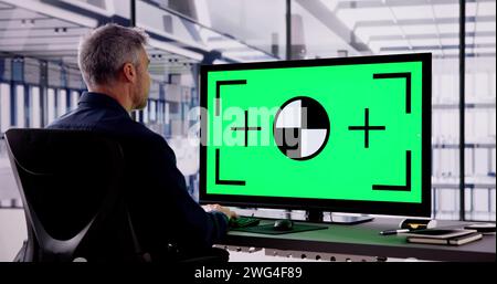 Business Man Using Desktop With Green Screen Stock Photo