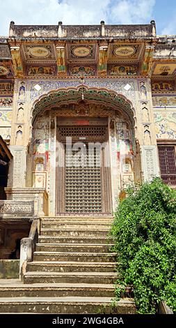 Paintings of Hindu God and Goddess on the Chokhani Double Haveli, Mandawa, Jhunjhunu, Rajasthan, India. Stock Photo