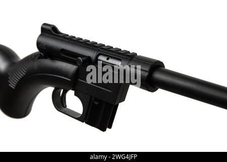 Small-bore bolt rifle in a plastic stock of .22lr. Small rifled weapon for hunting and sports. Isolate on a white background. Stock Photo