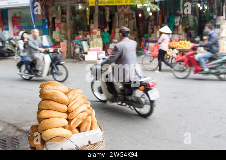 Vietnam, Hanoi, bread rolls for sale at at the Cho Dong Xuan Market. Stock Photo