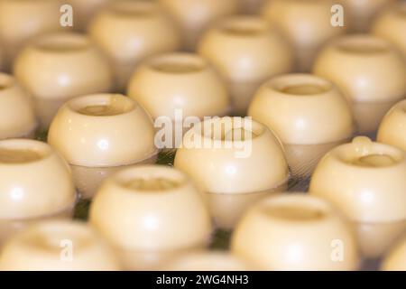 Chocolate and pralines in praline molds, DIY chocolate made at home in Vienna Stock Photo