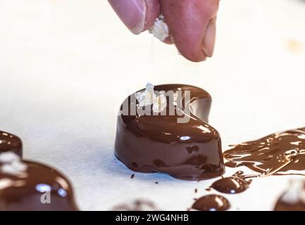 Chocolate and pralines in praline molds, DIY chocolate made at home in Vienna Stock Photo