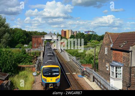 trans pennine express train crossing vintage selby rail bridge built in 1891 across the river ouse yorkshire united kingdom Stock Photo