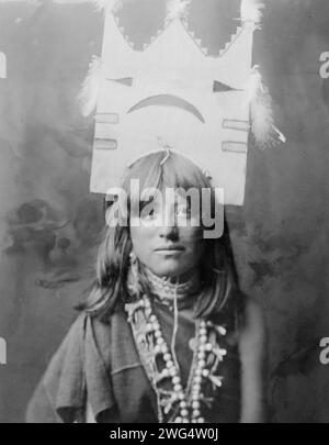 Tablita woman dancer-San Ildefonso, c1905. Head-and-shoulders portrait of woman with elaborate tablita headdress on crown of her head, facing front. Stock Photo