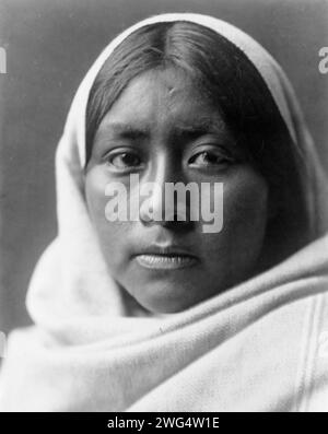 Papago girl, c1907. Papago Indian woman, bust portrait, wrapped in shawl. Stock Photo