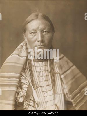Mrs. Jack Red Cloud, 1905. Photograph shows Mrs. Red Cloud, wearing shawl, head-and-shoulders portrait, facing front. Stock Photo