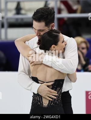 (240203) -- SHANGHAI, Feb. 3, 2024 (Xinhua) -- Deanna Stellato-Dudek (front)/Maxime Deschamps of Canada hug after their pairs free skating of ISU Four Continents Figure Skating Championships 2024 in Shanghai, east China, Feb. 3, 2024. (Xinhua/Wang Xiang) Stock Photo