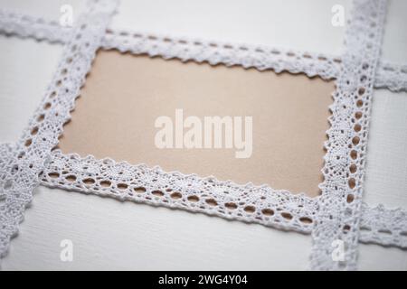 White lace tape on white canvas with brown blank center Stock Photo