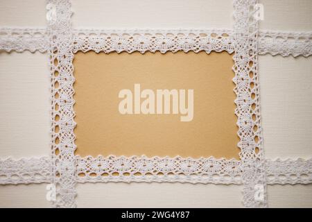 White lace tape on white canvas with brown blank center Stock Photo