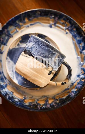 Set of Ceramic tableware, craft products on wood background Stock Photo
