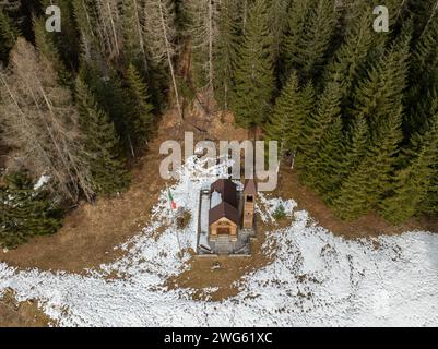 Chiesetta della Madonna della Neve. Panoramic view of the Dolomites mountains in winter, Italy. Ski resort in Dolomites, Italy. Aerial  drone view of Stock Photo