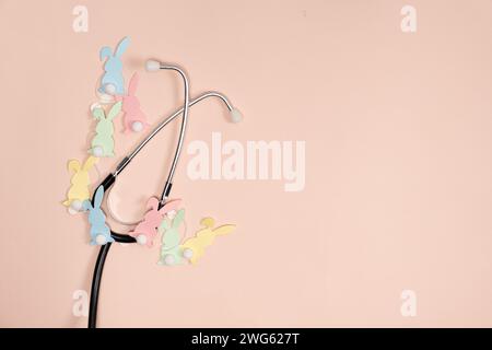 Medical Easter banner on peach color background, blank with space for text, top view. Stock Photo