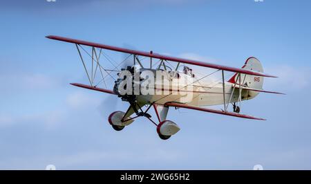 old Warden, UK - 2nd October 2022:  Vintage aircraft Curtiss wright travel air 4000 flying close to the ground Stock Photo