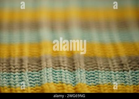 Soft background with striped blue, gray, yellow threads Stock Photo