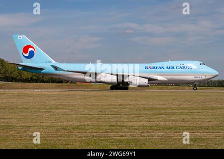Korean Air Cargo Boeing 747-400F with registration HL7434 rolling on taxiway V of Amsterdam Airport Schiphol Stock Photo