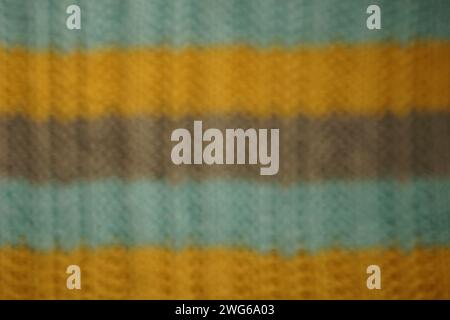 Unfocused blurred background with striped blue, gray, yellow threads Stock Photo