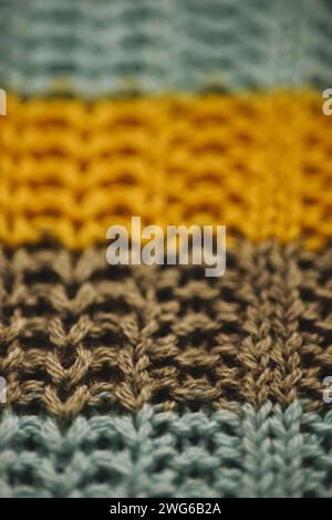 Striped sweater background blue, gray, yellow stripes. Stock Photo