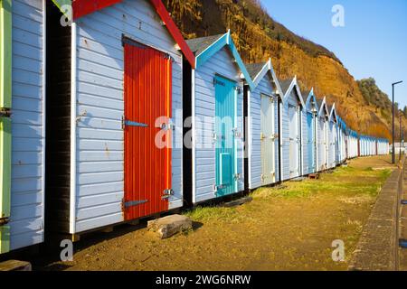 Row of colourful beach huts on the revetment at Shanklin, Isle of Wight Stock Photo