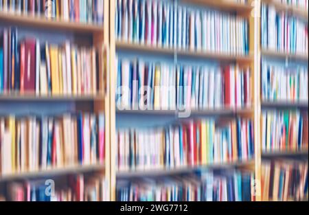 Motion blurred rows of books, abstract background. Stock Photo