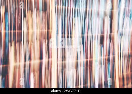 Motion blurred rows of books, abstract background. Stock Photo